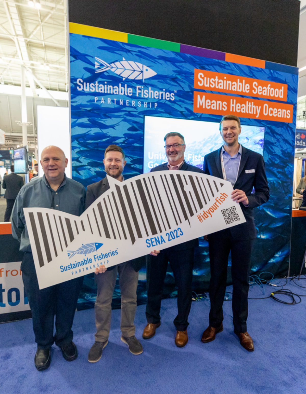 Fishery IDs pilot project participants with big fish at Seafood Expo North America