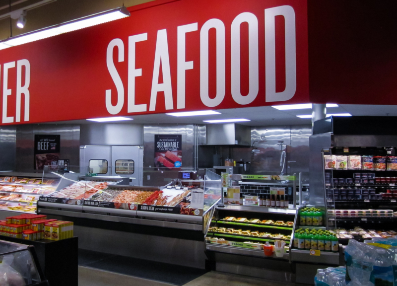 Seafood and butcher counter in supermarket