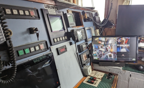 Bank of electronic equipment on a longline fishing vessel, including a screen showing images from the cameras used for electronic monitoring