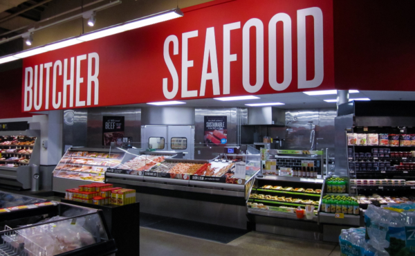 Seafood and butcher counter in supermarket
