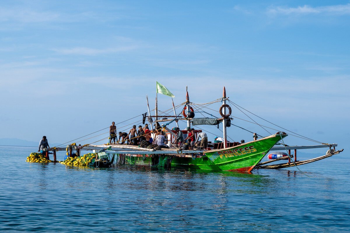 Fishermen in the early morning, Batangas, Philippines