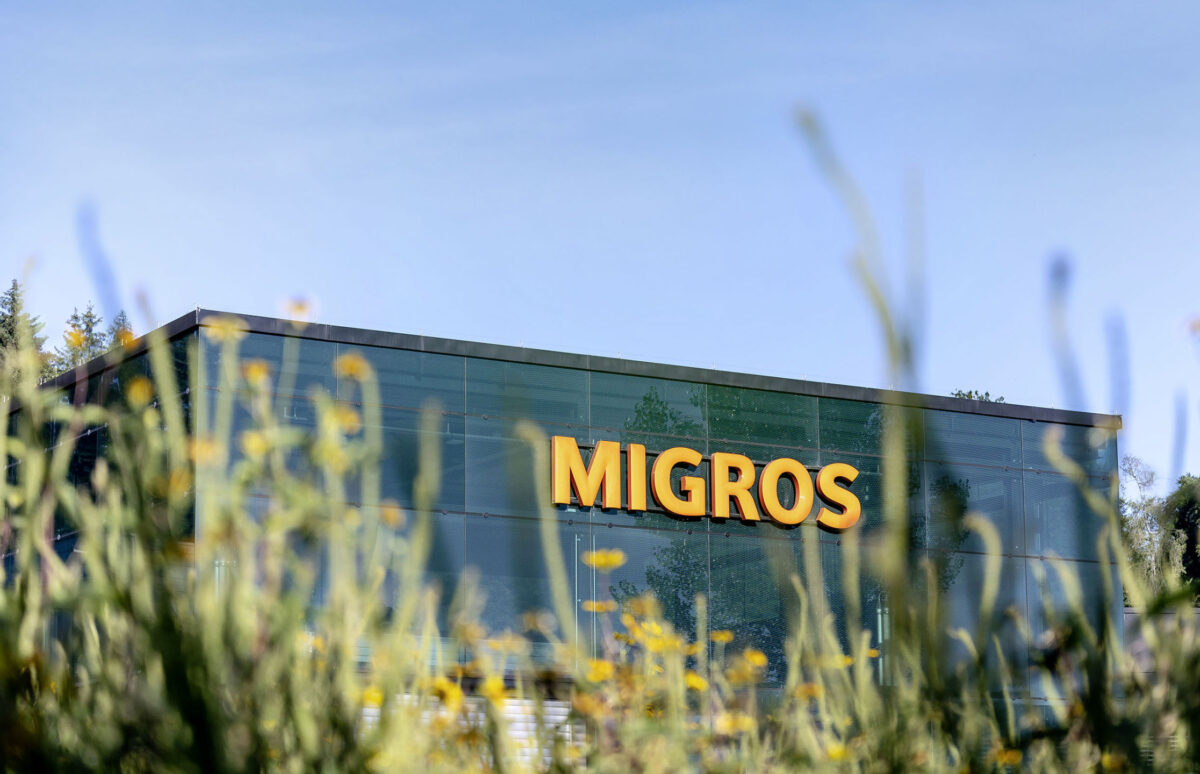 A view of the front of a Migros grocery store