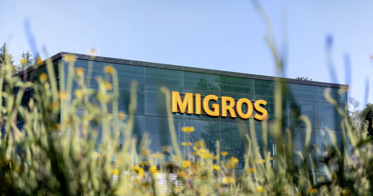 A view of the front of a Migros grocery store