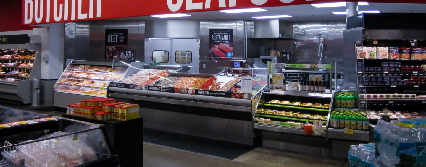 Seafood and butcher counter in supermarket