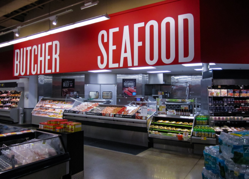 Seafood and butcher counter in supermarket