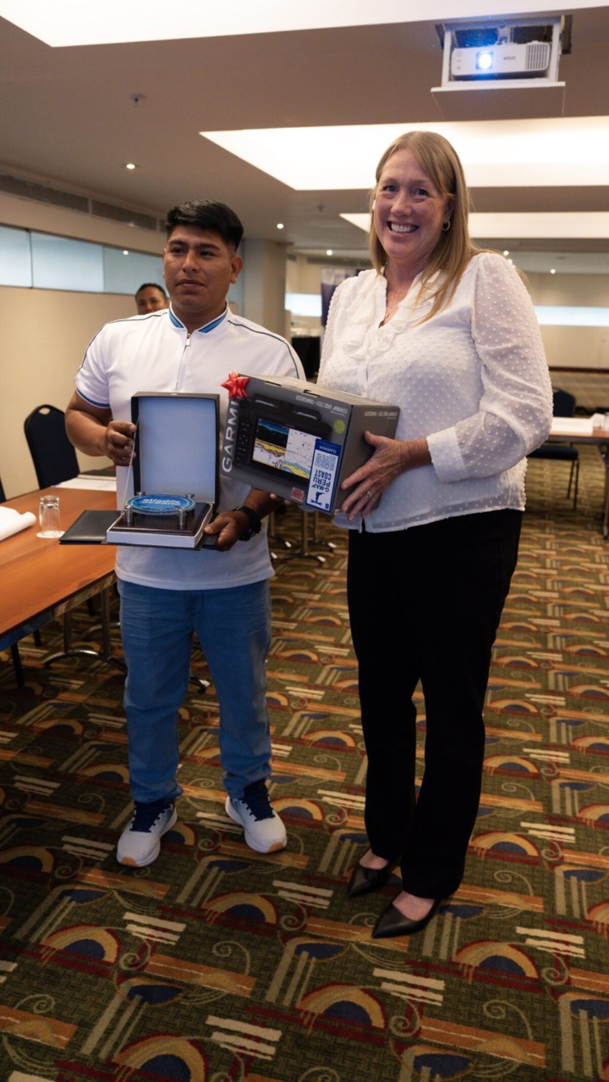 Peru’s First Place winner Henry Paúl Saavedra Vilchez with SFP Global Mahi Supply Chain Roundtable Lead Kerry Marhefka