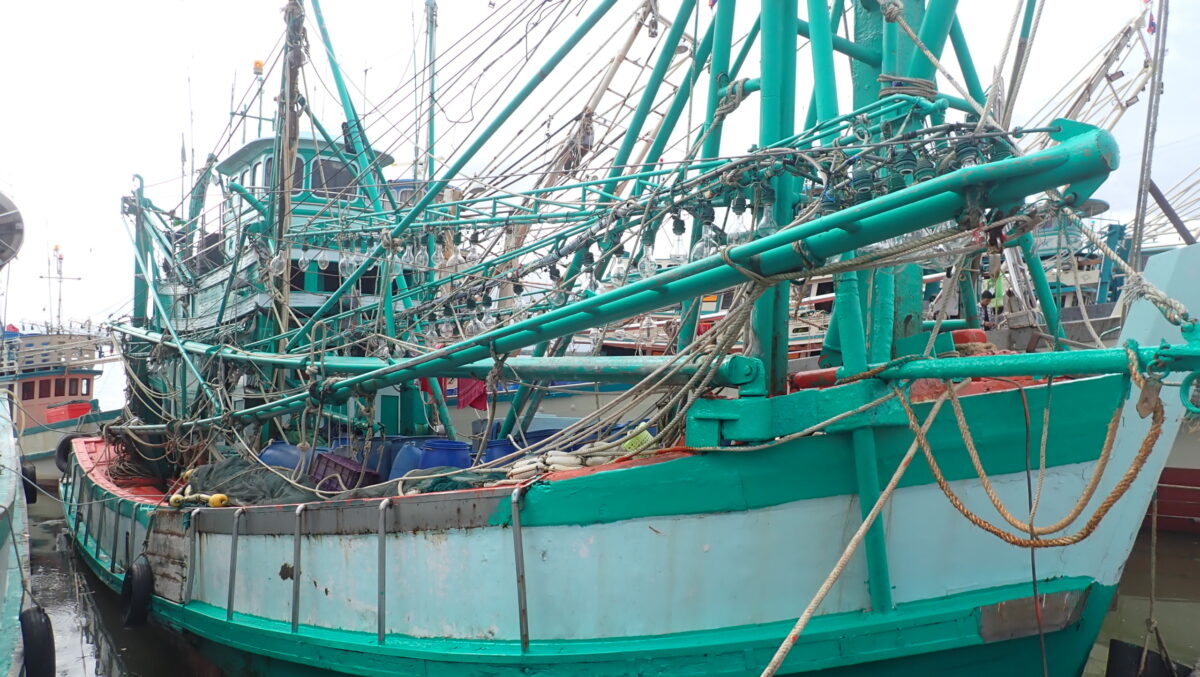 Green and white fishing boat in Gulf of Thailand