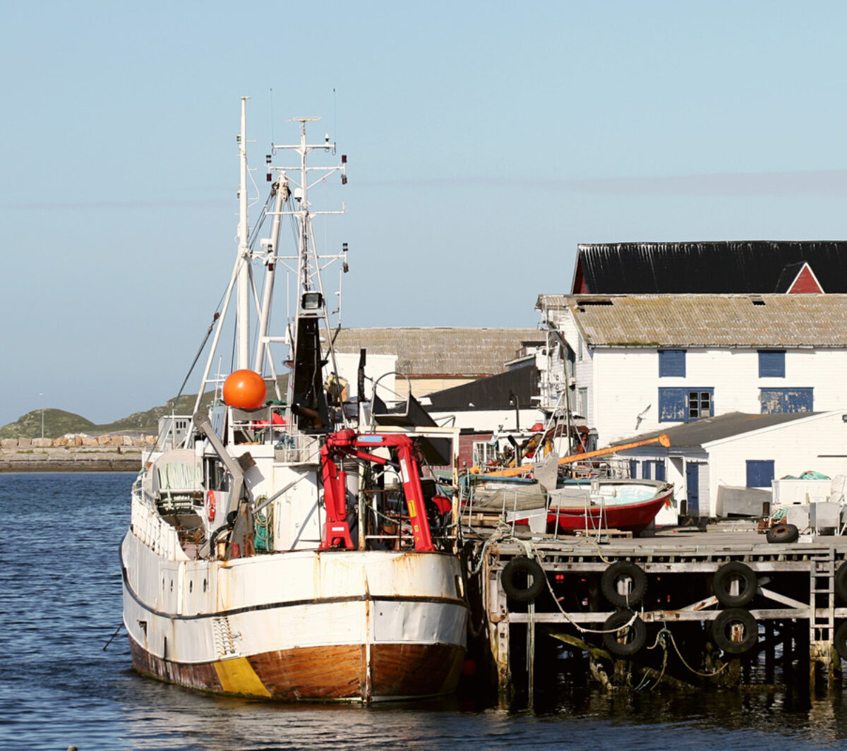 Boat pulled up to dock in Norwa